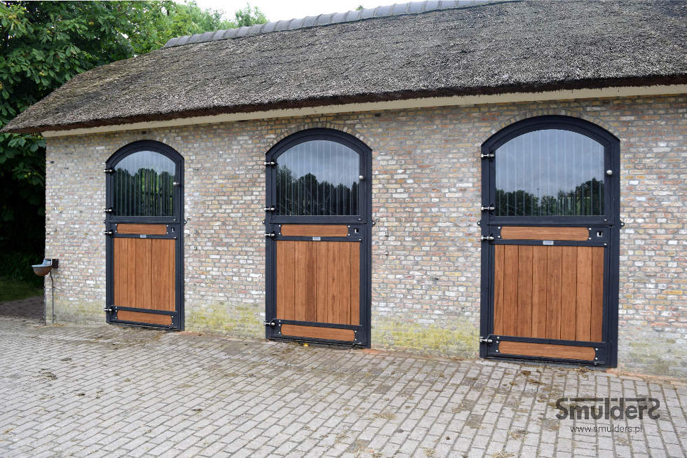 Arched hinged doors